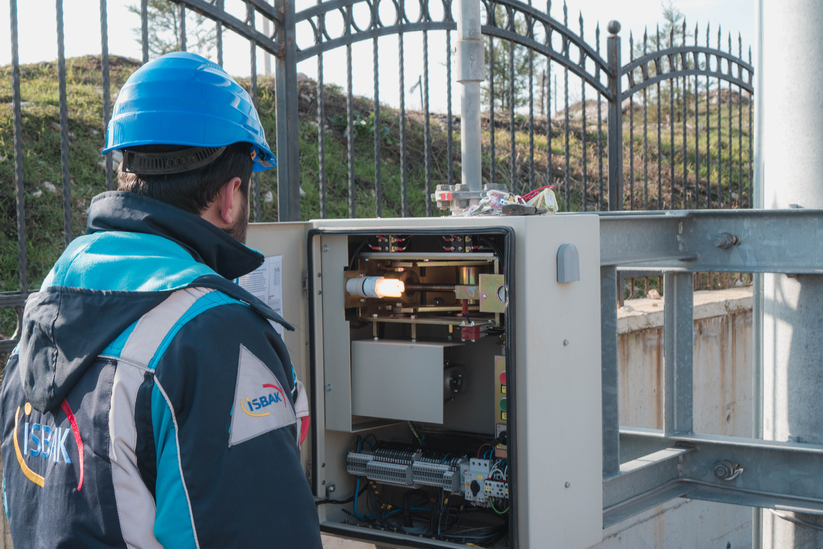 canva an electrician inspecting a fuse box MAEbuqVg by Spartan Electric in Northern Alabama